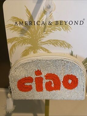 America & Beyond White Beaded Cosmetic Pouch with Orange 'giao' Accent